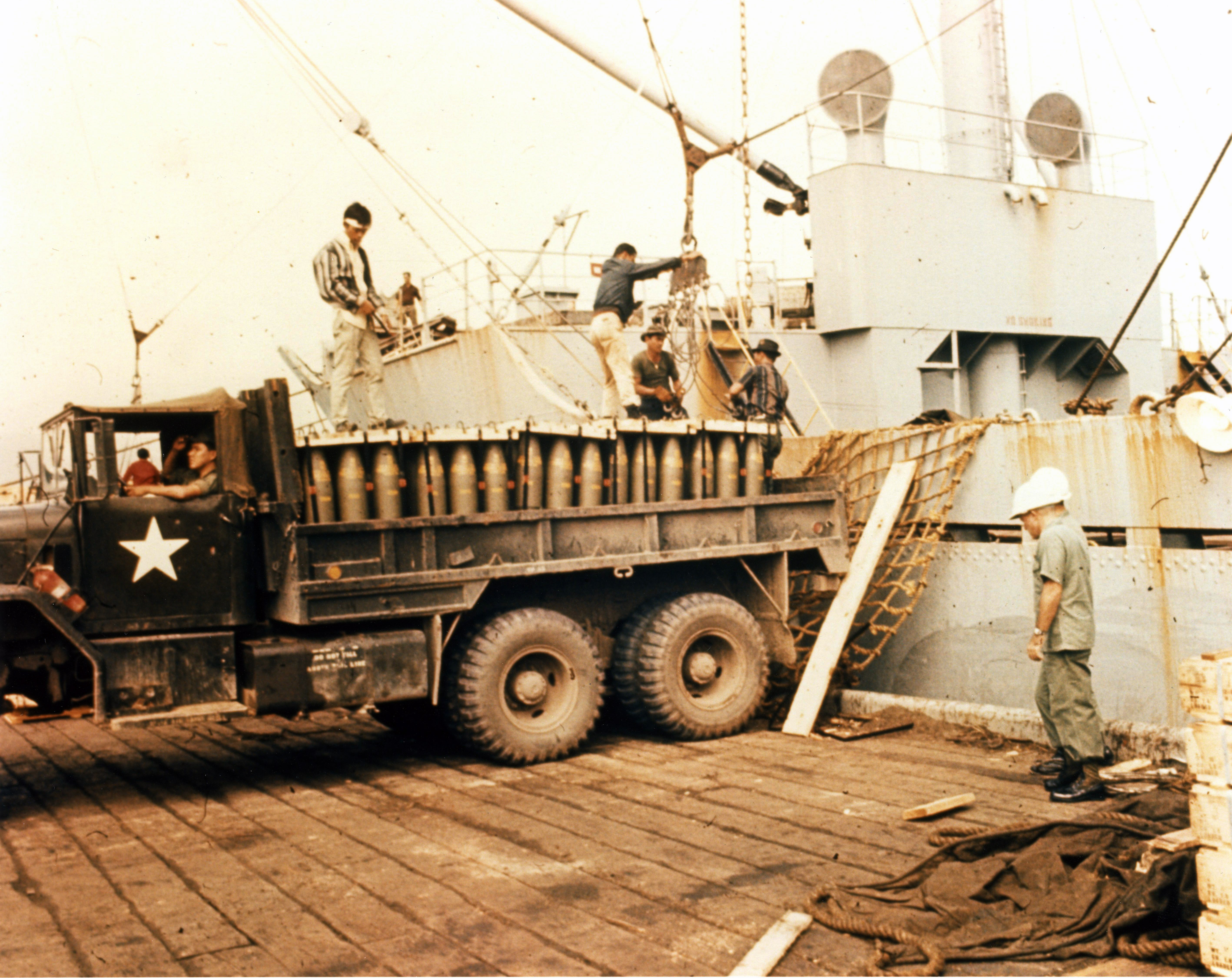 Coast Guard Explosive Loading Detachment oversees offloading of explosives into a U.S. Army truck. (U.S. Coast Guard) Coast Guard Explosive Loading Detachment oversees offloading of explosives into a U.S. Army truck. (U.S. Coast Guard)